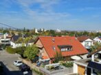 Blick vom Schlafzimmerbalkon - Erstbezug nach Renovierung – Helles, großzügiges Wohnen mit Kamin & drei Balkonen!