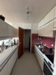 Küche mit Zugang zum Abstellraum - Attraktive 1,5 Zimmer Wohnung mit Fernblick in Stuttgart-Asemwald!